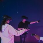 friends playing a virtual reality game together